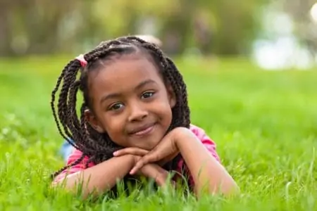 portrait of a cute young black african girl smiling
