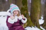Norwegian little cute girl in the snow