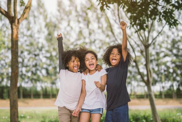 Cheerful black american kids at the park