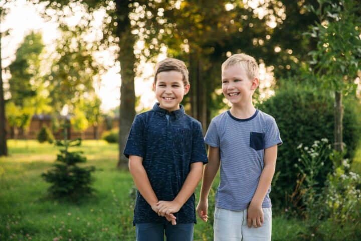 Cheerful young boys having fun at the park